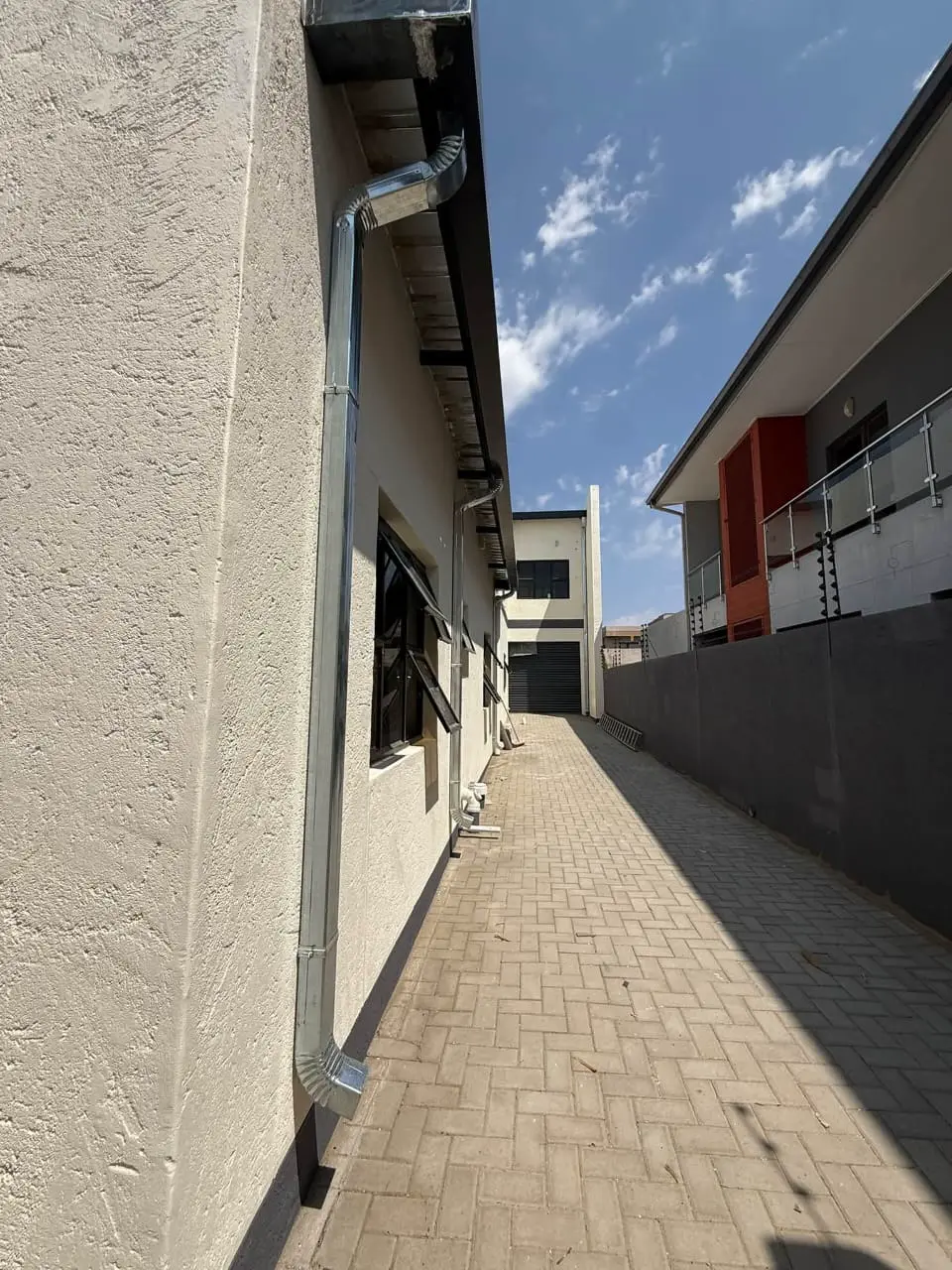 Outside: Side passage along the house