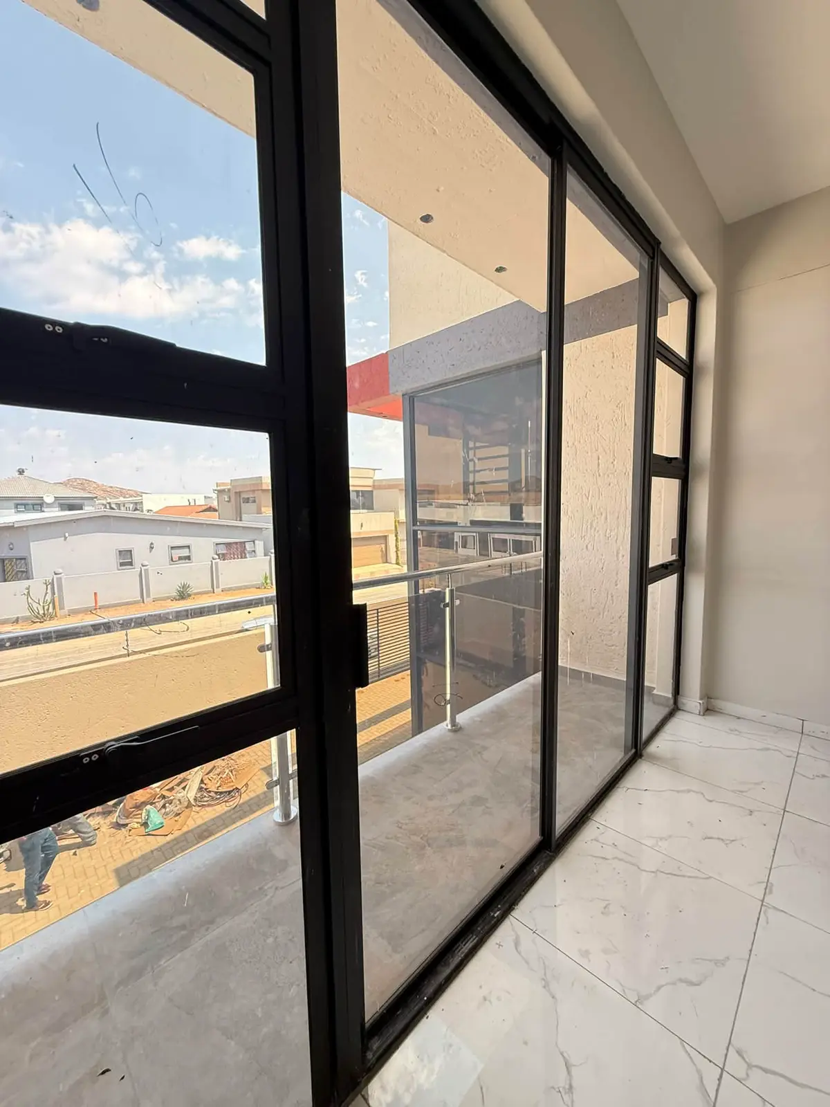 Upper floor: Sliding doors to the balcony